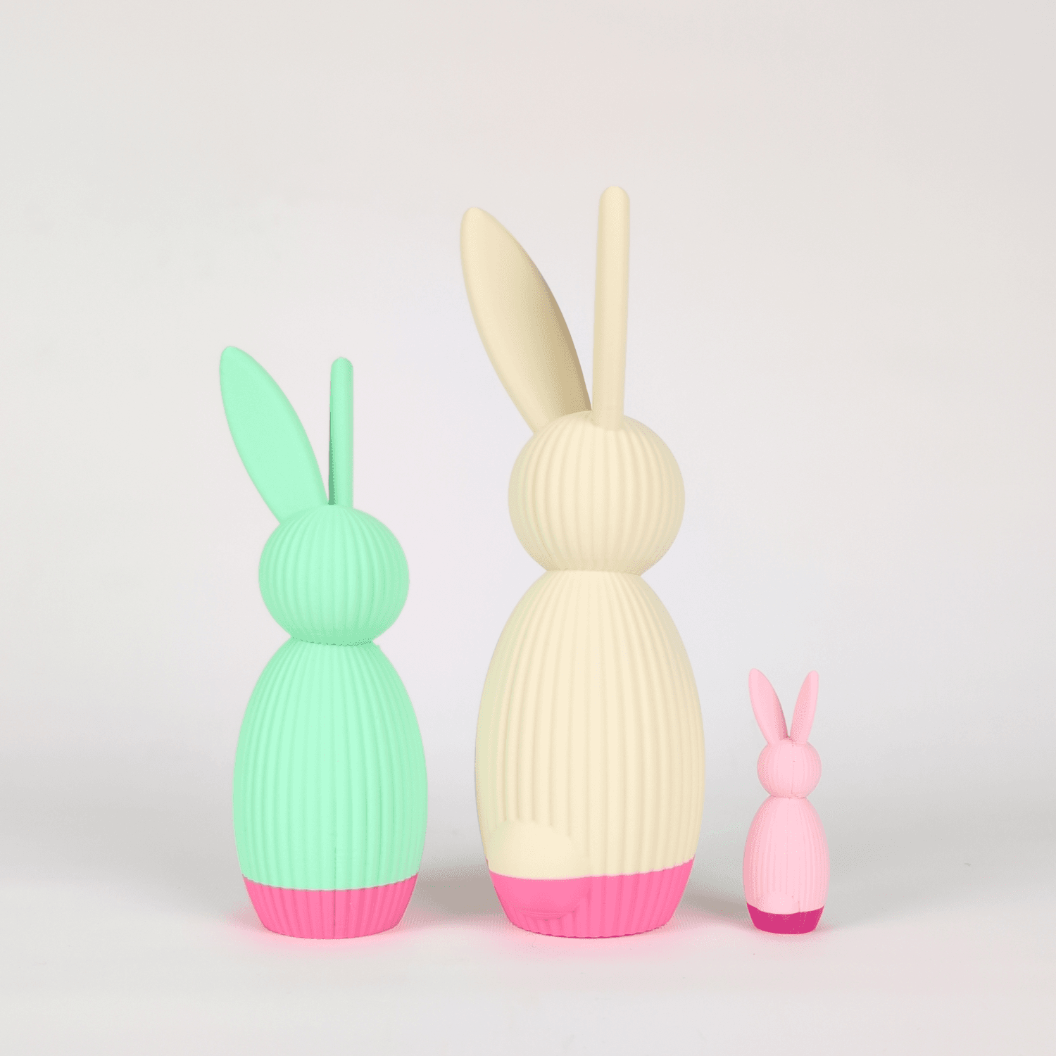 Hasen in Mint und Beige mit kleinem rosa Hasen
